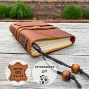 Leren notitieboek met veter en naam – 1